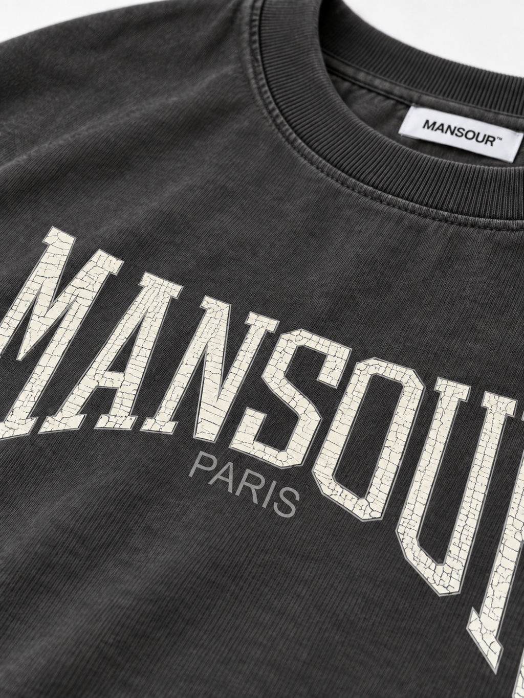 Cracked Print Longsleeve Black d'Art. Department, détail du logo