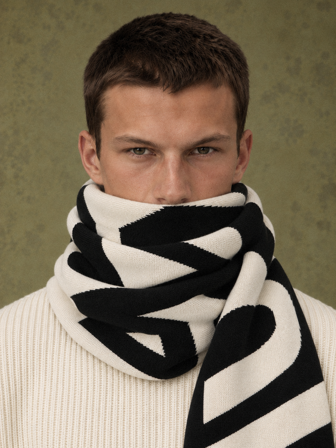 Jacquard Logo Scarf Black by Art. Department, worn by model, close-up