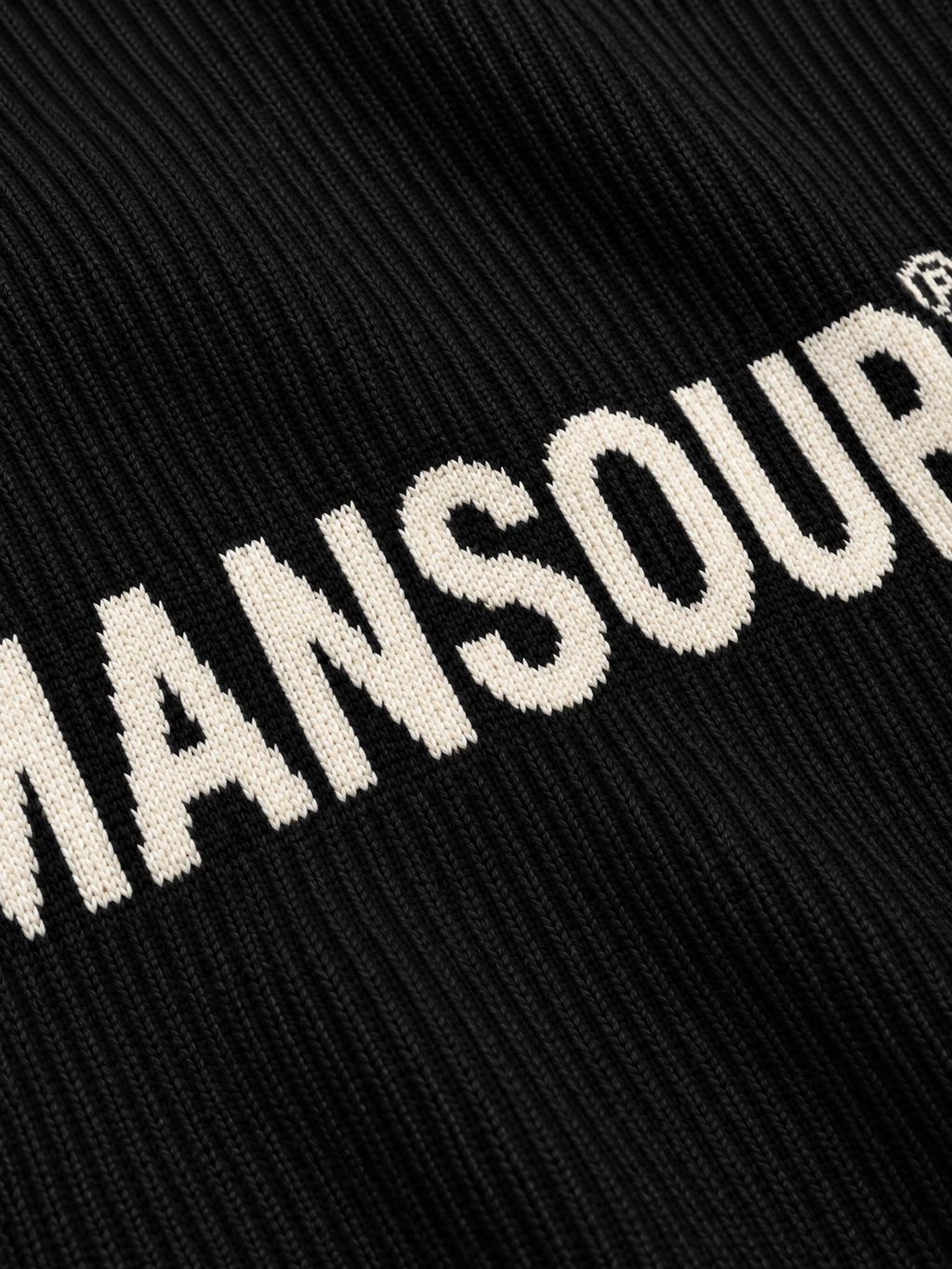 Ribbed Logo Sweater Black d'Art. Department, détail du logo