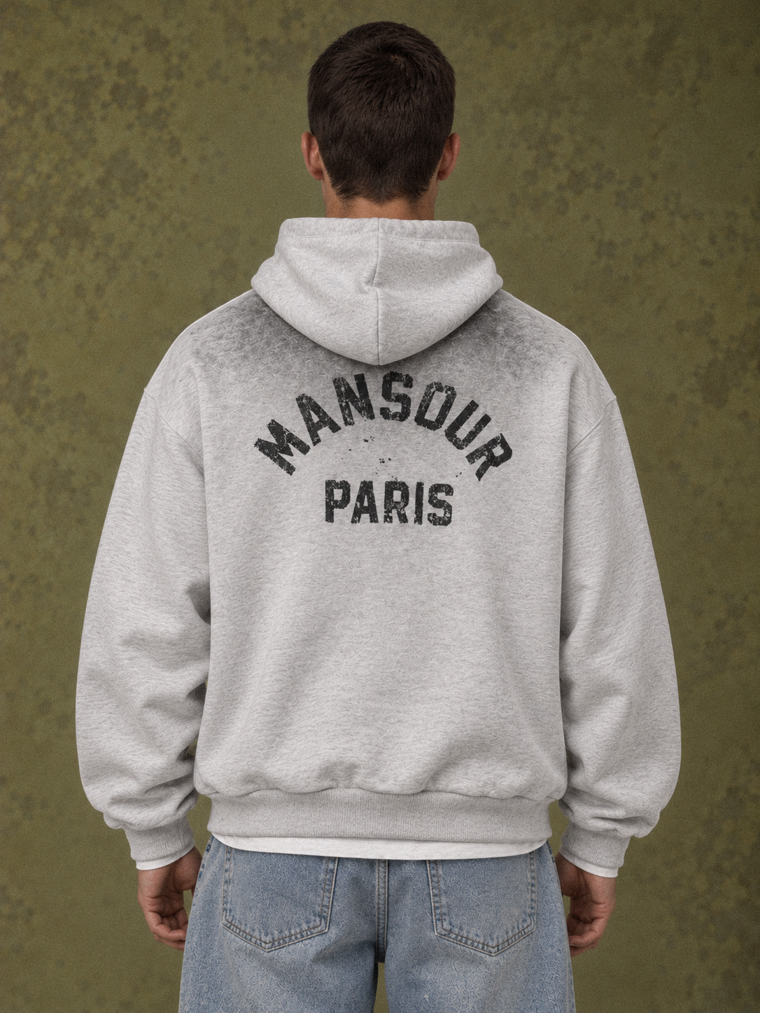 Sprayed Hoodie Athletic Heather d'Art. Department, porté par un mannequin, vue de dos